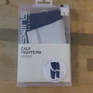 Pair of brand new Skins calf tights MX